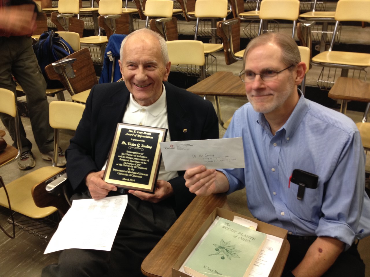 Dr. Soukup receiving an award for his dedication of 39 years to the herbarium. He is pictured with Dr. Steven H. Rogstad.